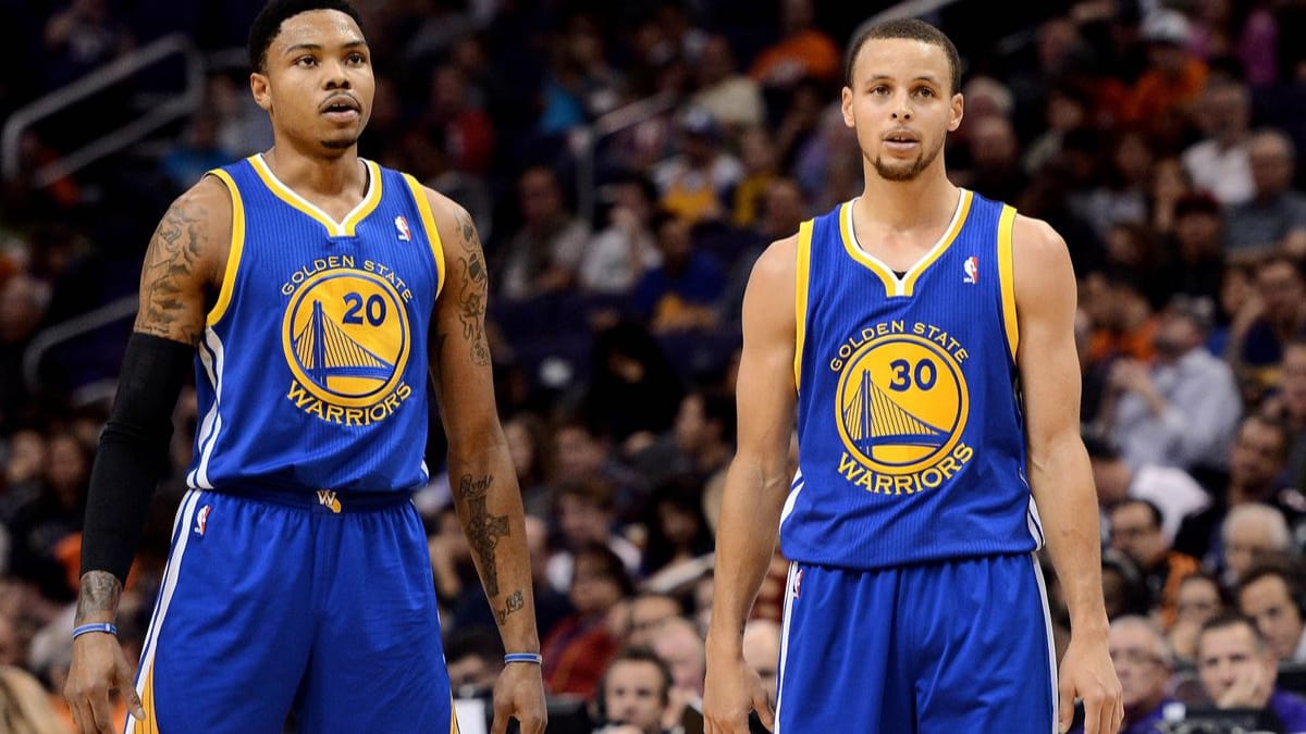 Stephen Curry helped by his Warriors’ supporting cast tops Heat in OT