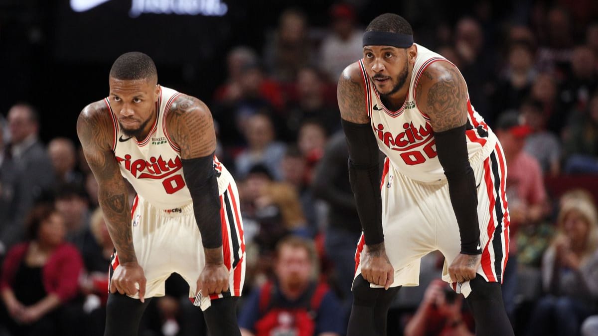 Carmelo Anthony and Damian Lillard give Trail Blazers edge over Sixers in wild game