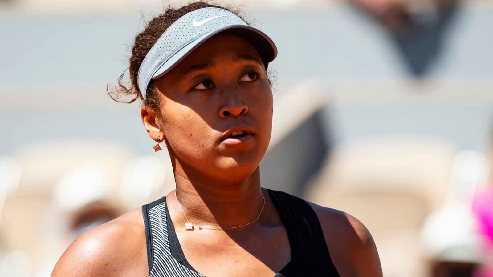 Naomi Osaka walks out teary-eyed during a press conference in Cincinnati; wants to respond to the media questions on email