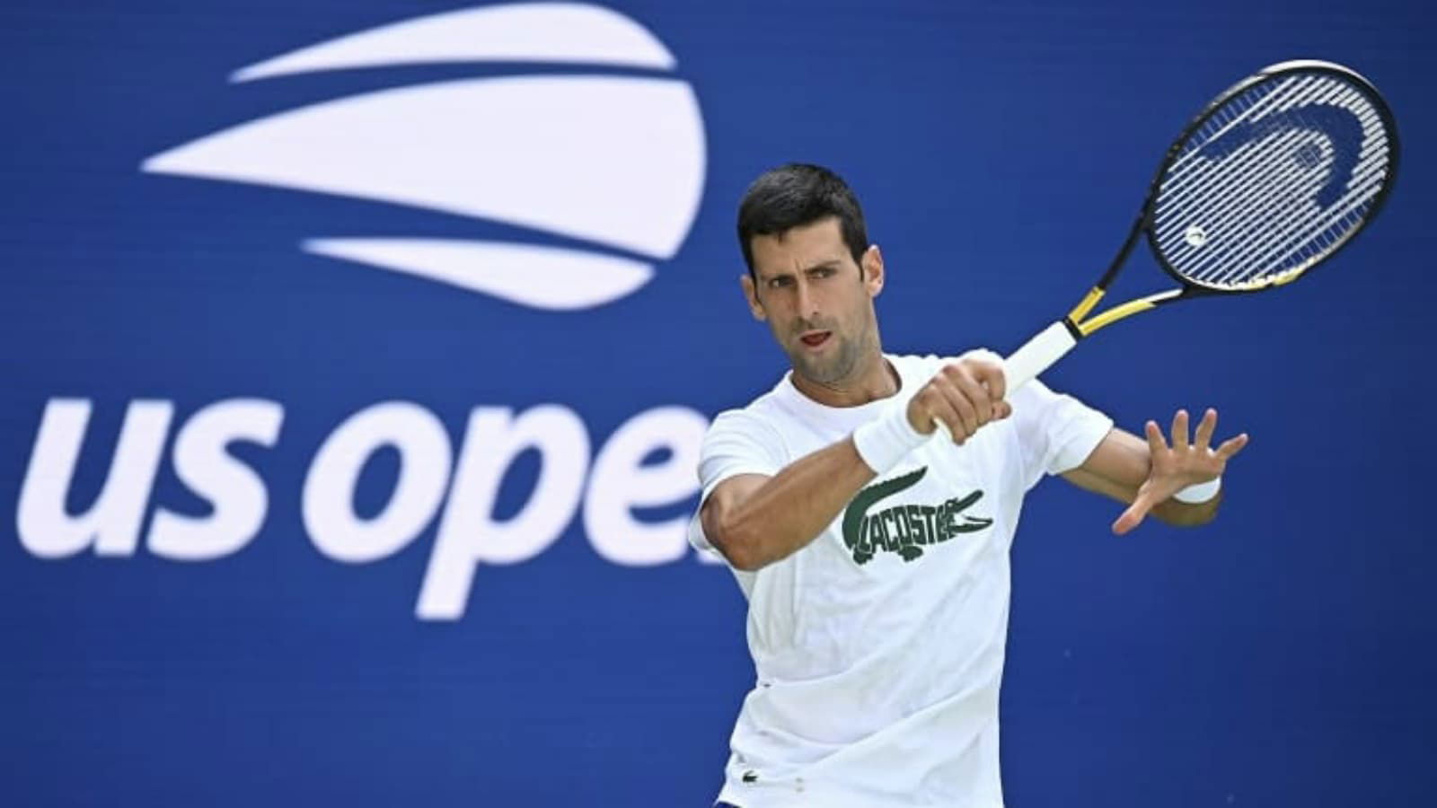 Back To Routine: Novak Djokovic heads to the practice court after landing in Belgrade