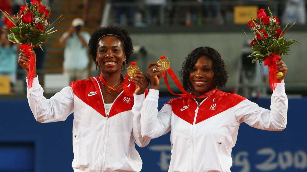 Venus Williams and Serena Williams with their Doubles Gold won in 2008 Olympics