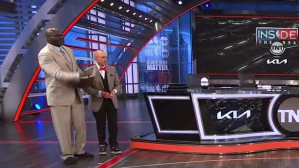 Shaquille O'Neal with Ernie Johnson throws egg on the floor