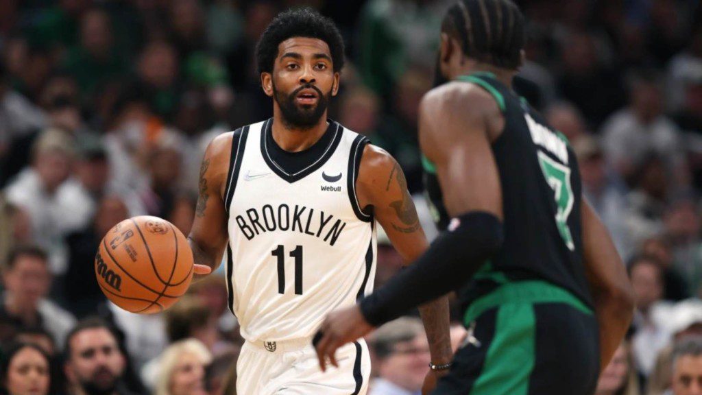 Kyrie Irving in action against the Boston Celtics