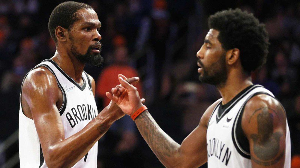 Kevin Durant and Kyrie Irving in action against the Knicks