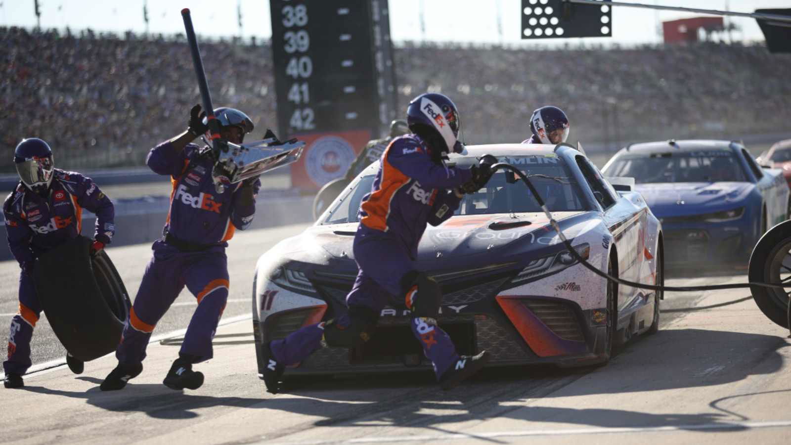 Joe Gibbs Racing produced a NASCAR record pit stop amidst Kyle Bush’s black flag drama at Richmond Raceway