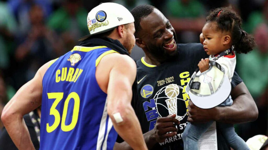 Draymond Green and his daughter with Stephen Curry