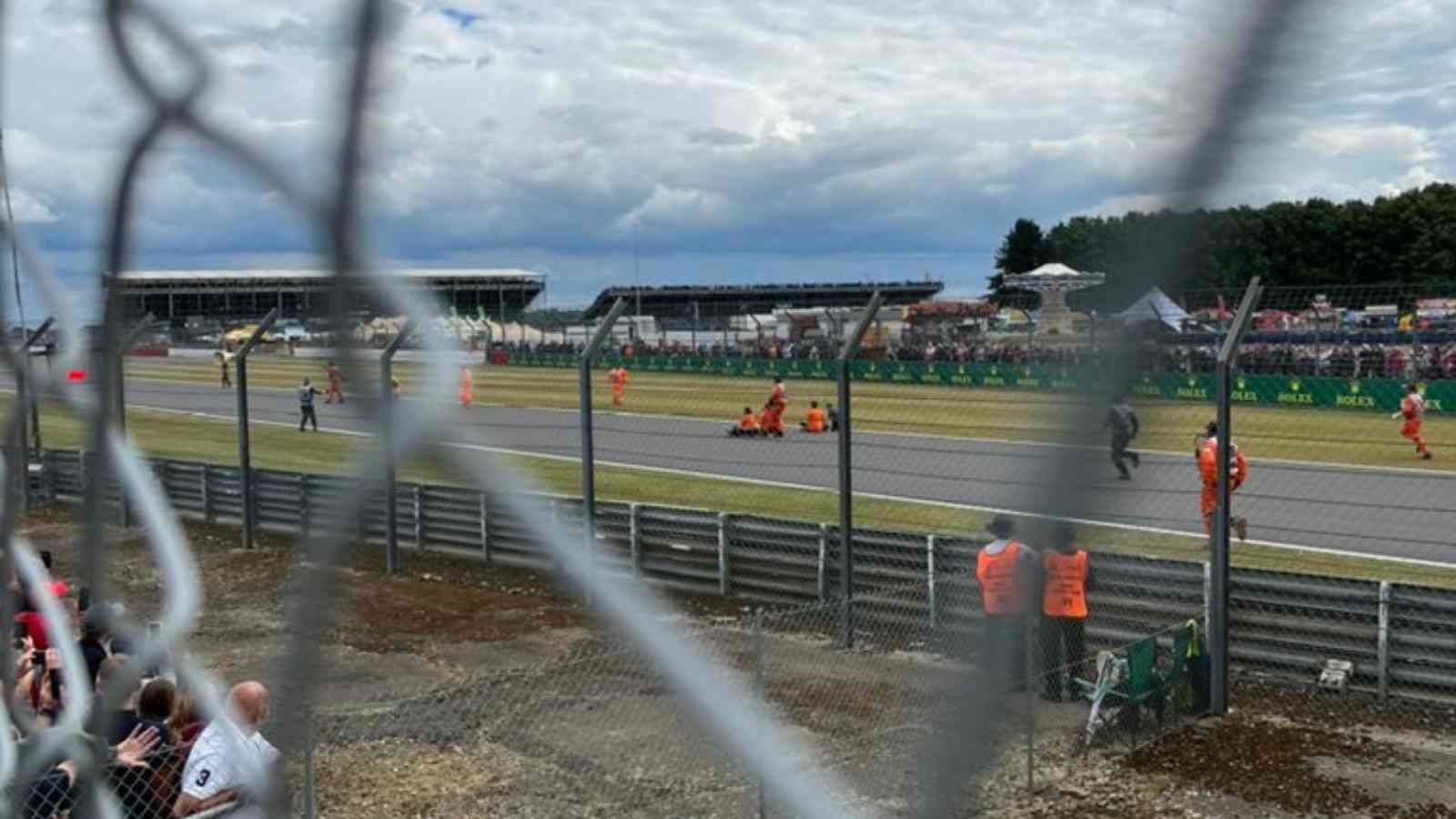 British GP 2022: Protestors storm onto the track on opening lap of Silverstone