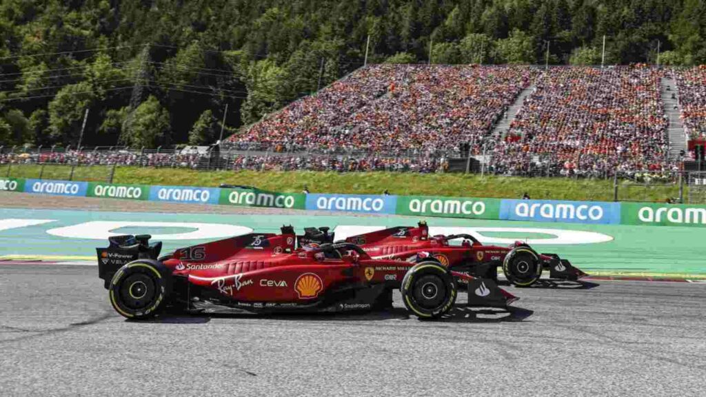 Charles Leclerc and Carlos Sainz battling in their Ferrari