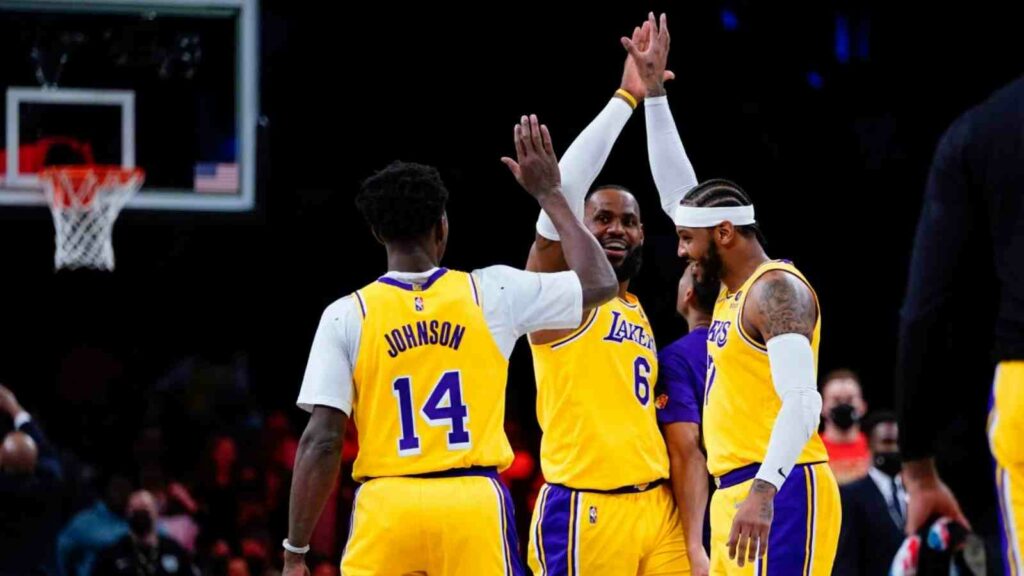 Lebron James with Stanley Johnson and Carmelo Anthony