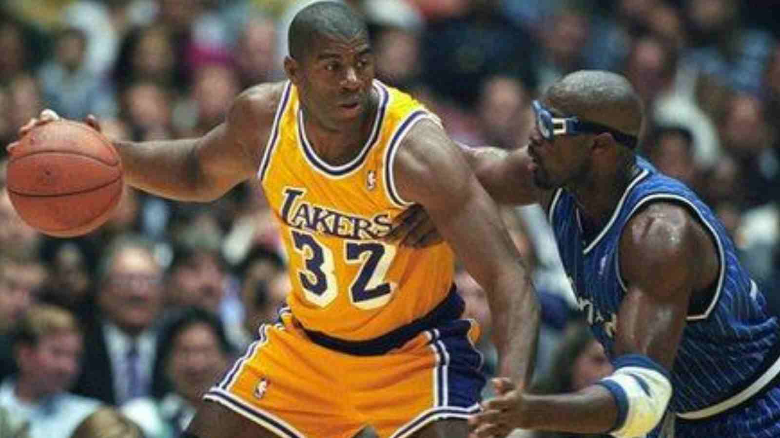 Magic Johnson posting up Horace Grant in 1996