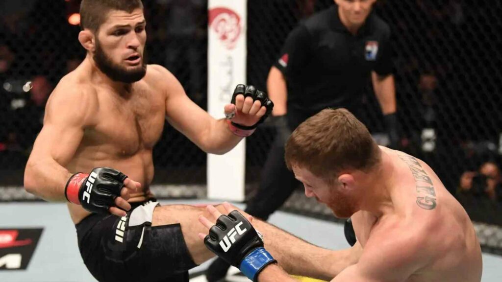 Khabib Nurmagomedov (L) mauling his way to a victory against Justin Gaethje (R) at UFC 254