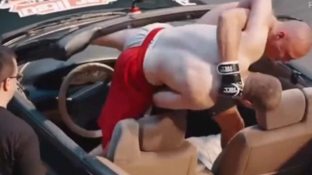 WATCH: Dropped on the front seat! Peculiar MMA match-up takes place in car 1 Another still of the bizarre MMA bout that took place in a car