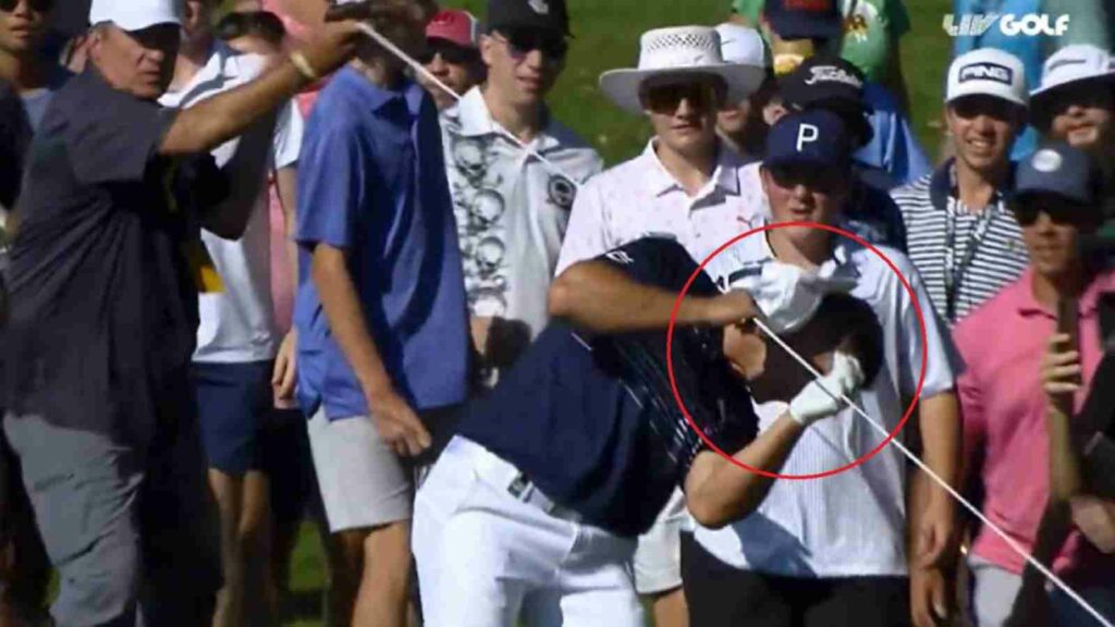 Bryson DeChambeau getting stuck on the face with a spectator rope