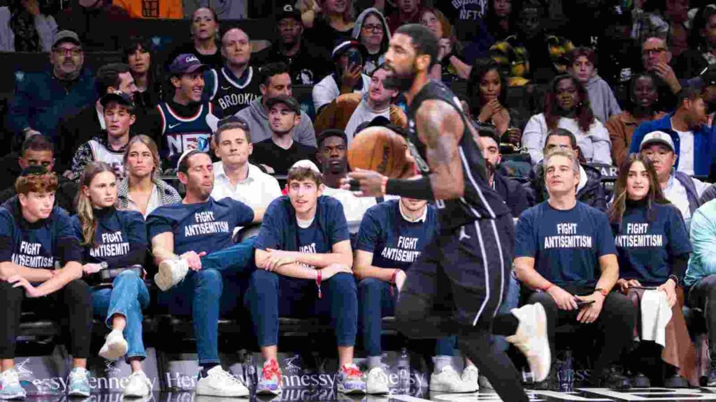 Brooklyn Nets fans wearing shirts against Anti-Semitism and Kyrie Irving