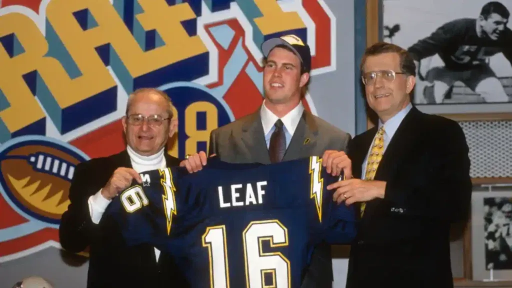 Ryan Leaf showing his jersey 