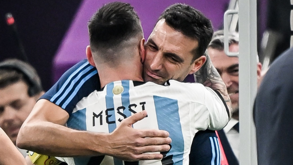 Scaloni and Messi hug each other after Argentina win