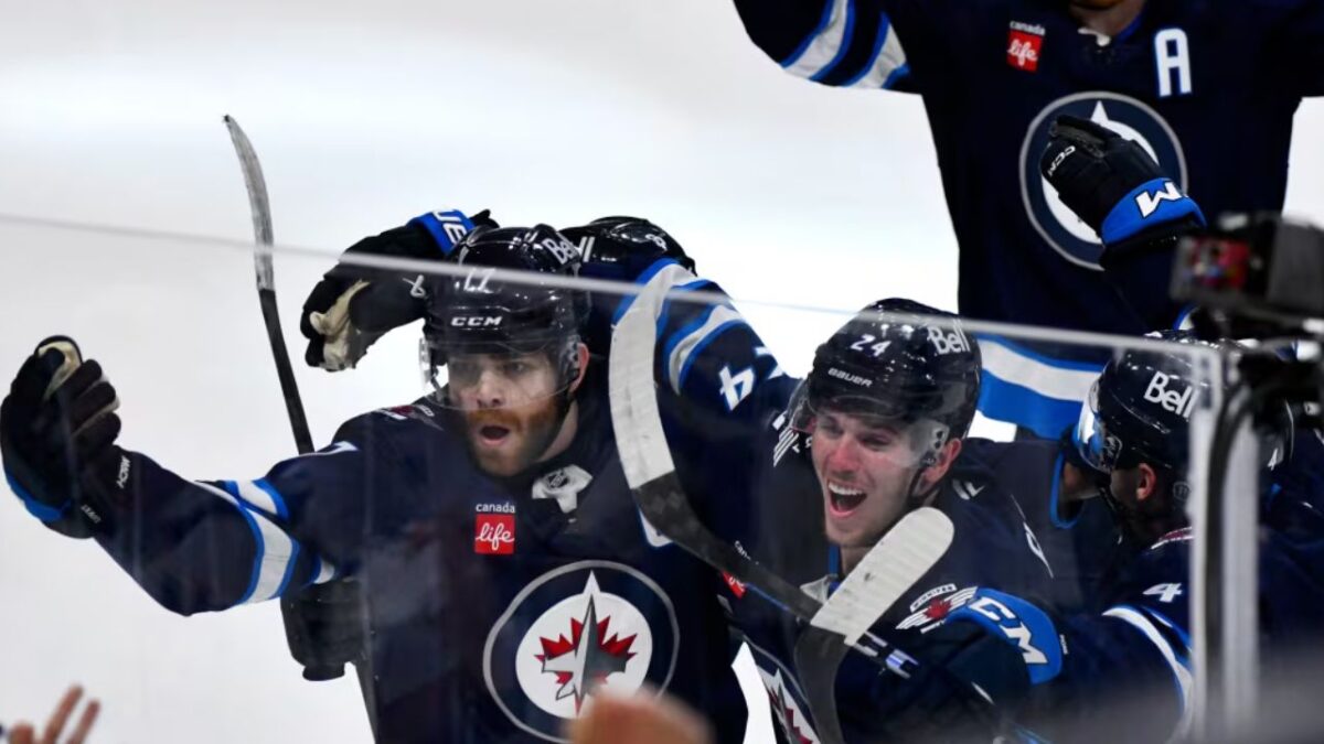 "Legendary choke" - NHL fans react as Jets captain Adam Lowry's 2OT winner SHOCKS Blues in Game 7 3 Adam Lowry and Winnipeg Jets celebrating their win