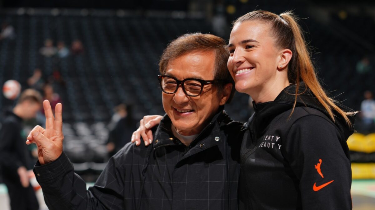 Shai Gilgeous-Alexander Catches Stray From WNBA Star Sabrina Ionescu Over Free Throws 1 Sabrina Ionescu with Hollywood legend Jackie Chan at Barclays Center