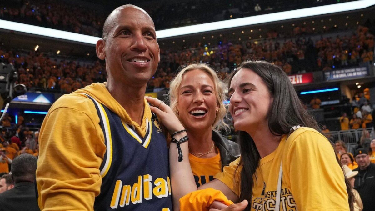 Caitlin Clark Boyfriend Calls Out Nike After Alex Caruso Wears Girlfriend's Stunning Shoes in NBA Finals 1 Caitlin Clark with Reggie Miller and Sophie Cunningham at the NBA Finals
