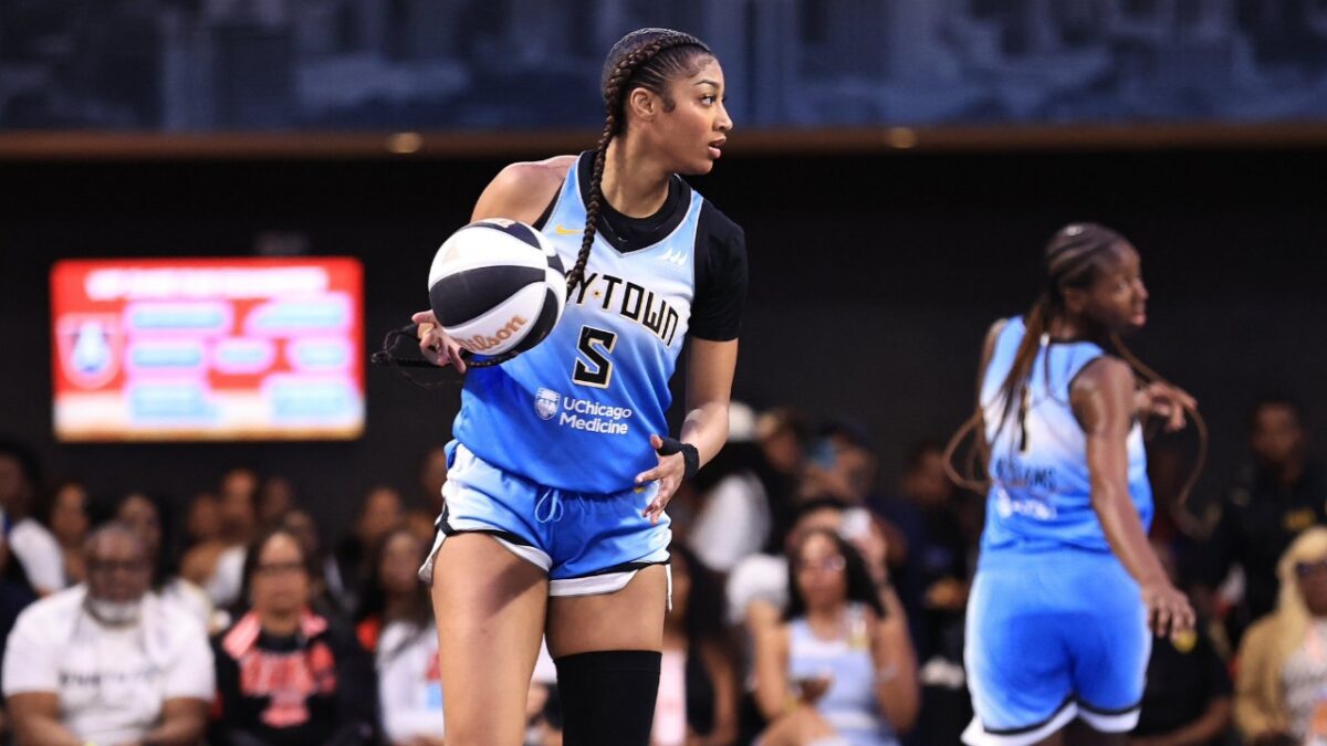 3 Ways Caitlin Clark, Angel Reese and Paige Bueckers are Breaking WNBA's Stereotypes 3 Angel Reese with the ball outside the paint