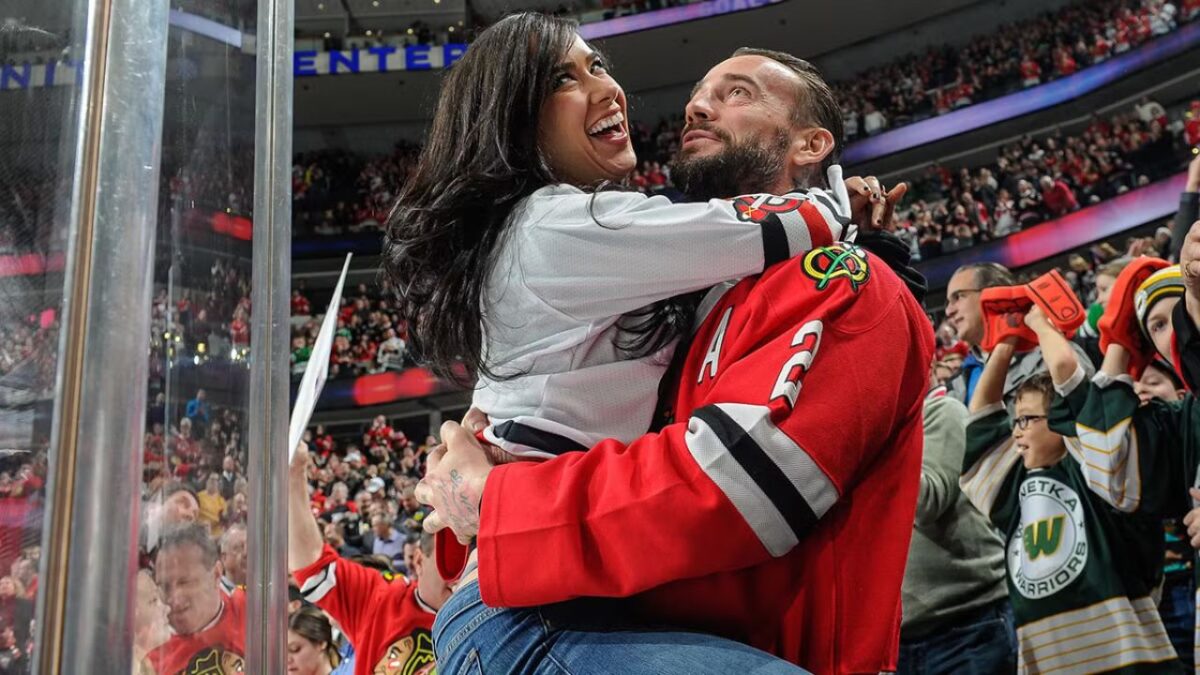 AJ Lee Rumored to Return at Evolution – Will She Jump Straight into the World Title Picture? 2 CM Punk and AJ Lee