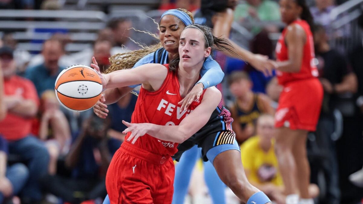 Caitlin Clark and Jordin Canada battling