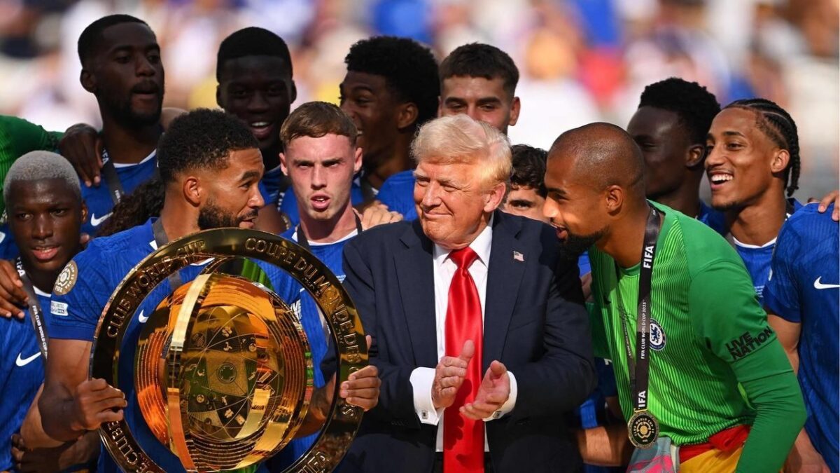 A visibly confused Cole Palmer is seen in the background while Donald Trump stays on the podium amid Chelsea’s celebrations. 
