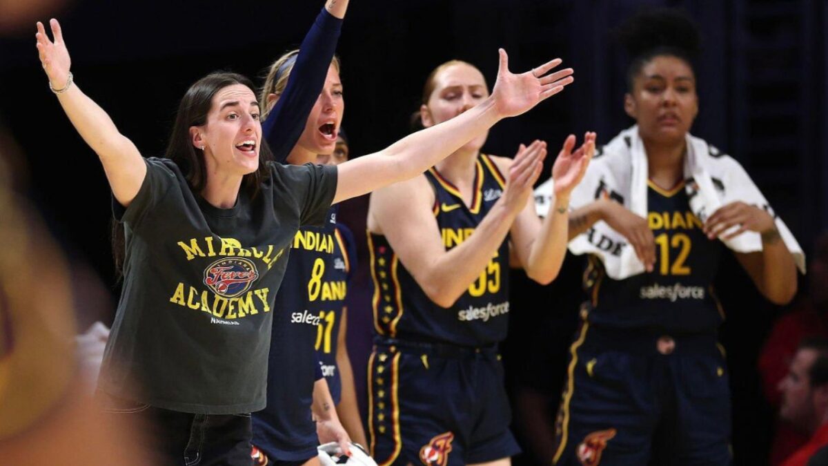 Caitlin Clark and her Fever teammates in the game against the Spark
