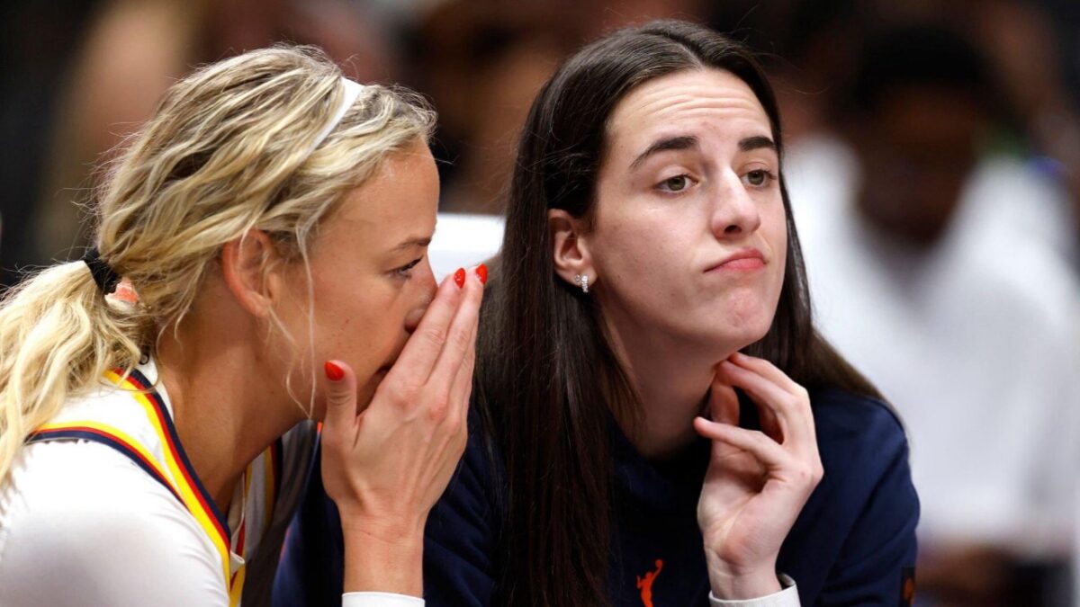 Caitlin Clark and Sophie Cunningham at the game