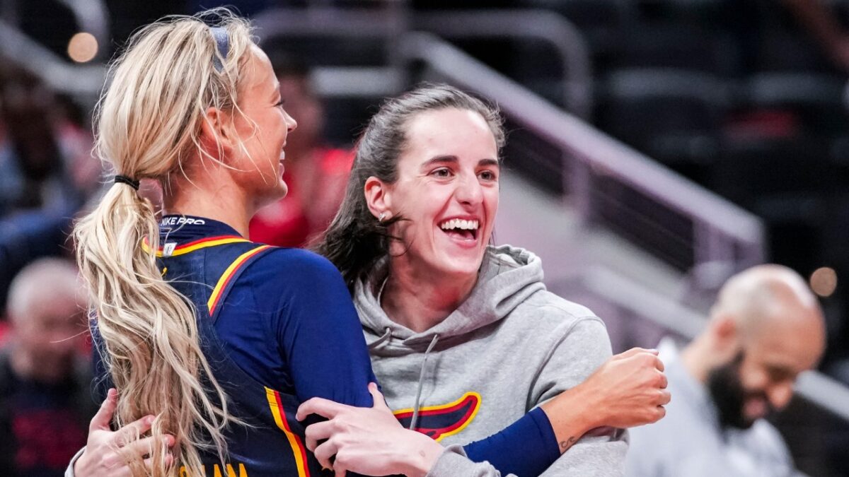 Sophie Cunningham and Caitlin Clark having fun at a game