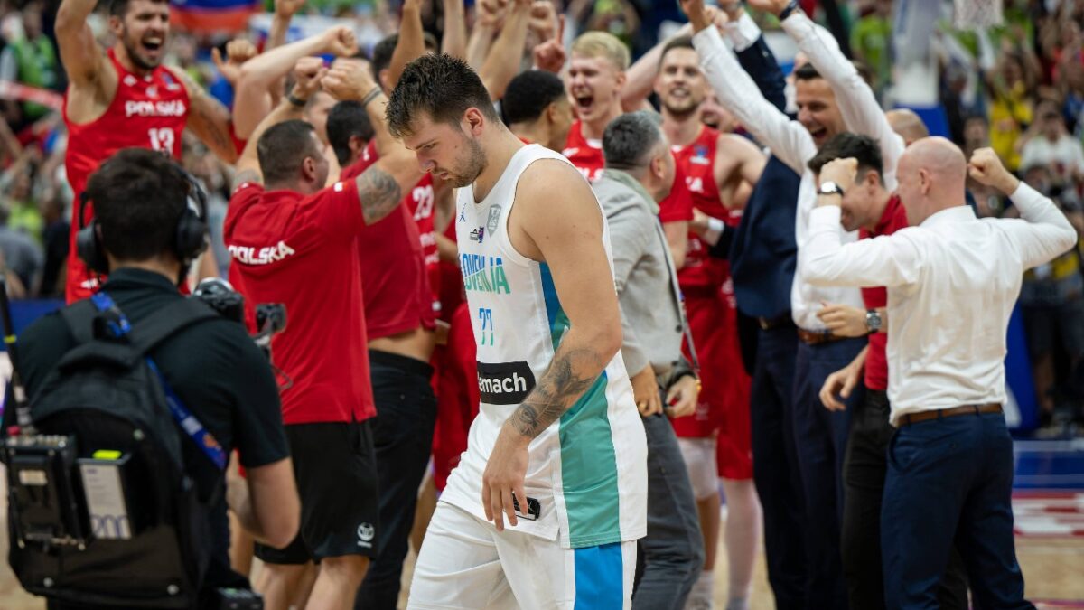 Luka Doncic walks off after loss to Poland