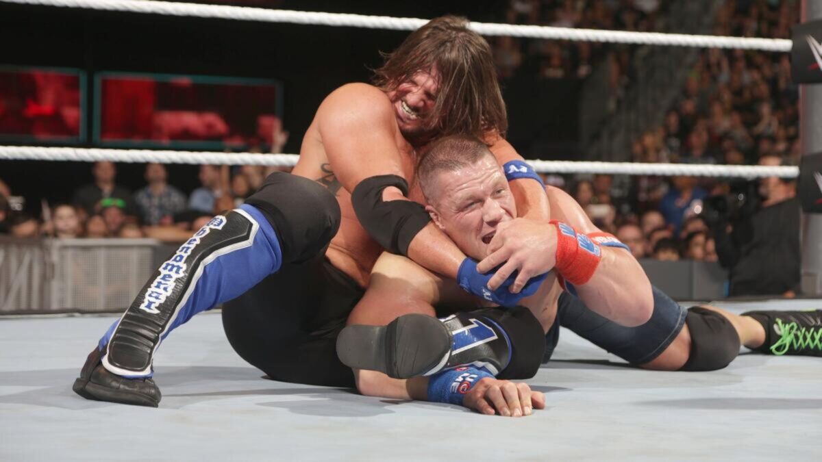 John Cena Outlasts Logan in an All-Time Classic at WWE Clash in Paris Amidst Iconic Tributes 1 John Cena and AJ Styles