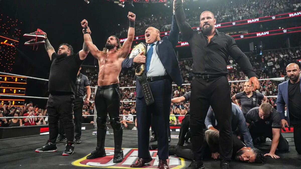 The Vision standing tall over Roman Reigns