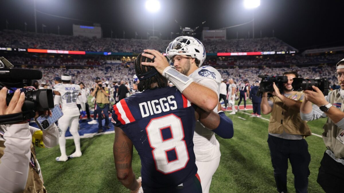 Stefon Diggs and Josh Allen embrace after the game