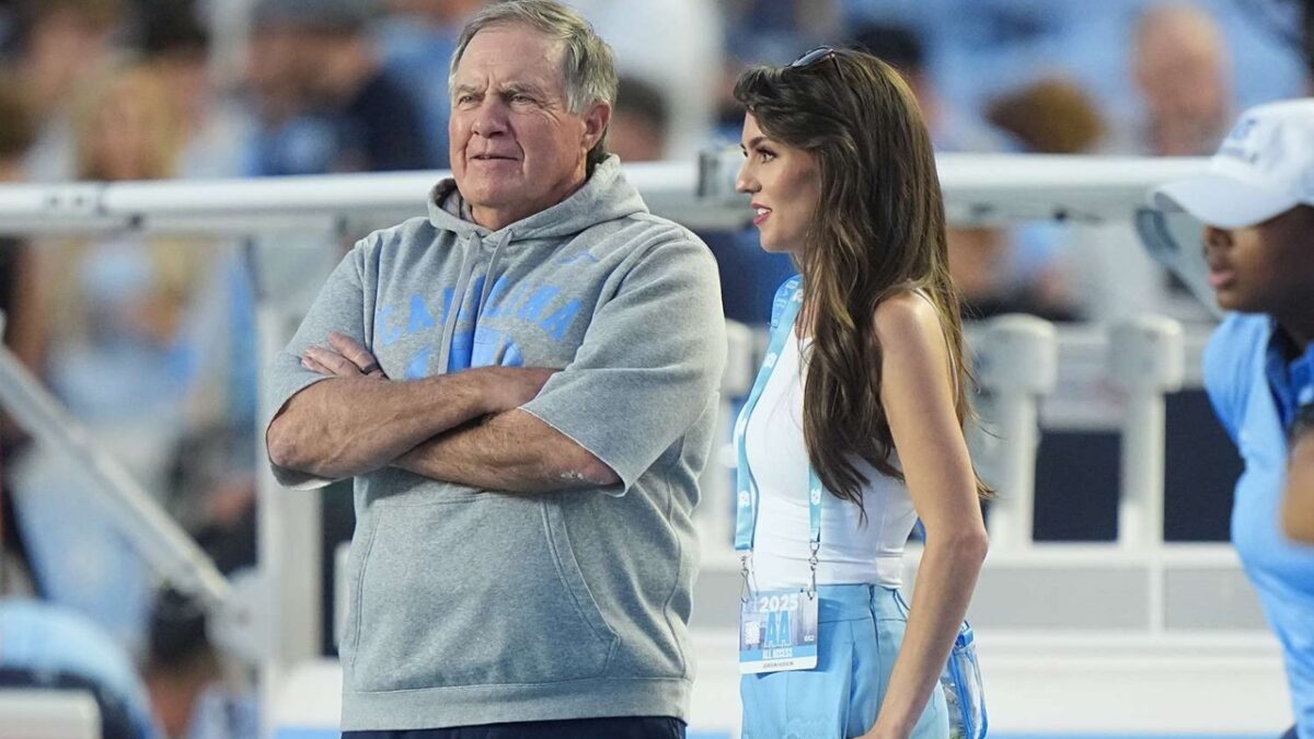 Jordon Hudson Belittling Staff During Shooting of Bill Belichick's 'Coach' Infuriates Fans - "She Things She's The Smartest Person" 1 Bill Belichick and Jordon Hudson on the sidelines