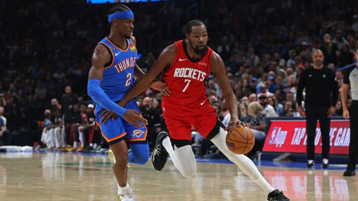 Kevin Durant, Stephen Curry, Luka Doncic Electrify Fans on NBA’s Opening Night 1 Shai Gilgeous-Alexander guarding Kevin Durant