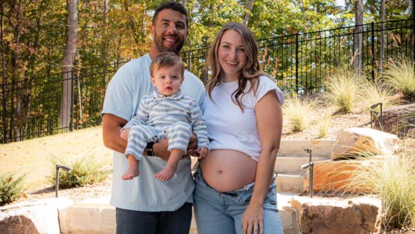Bubba Wallace with his wife Amanda Wallace and son Becks (via @BubbaWallace/X)