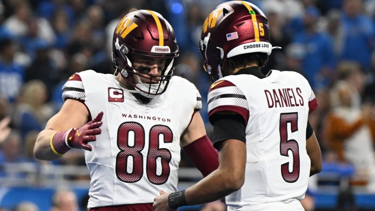 Dan Quinn Accepts Responsibility for Jayden Daniels' Freak Injury: "It's 100% On Me" 1 Zach Ertz and Jayden Daniels in happier times