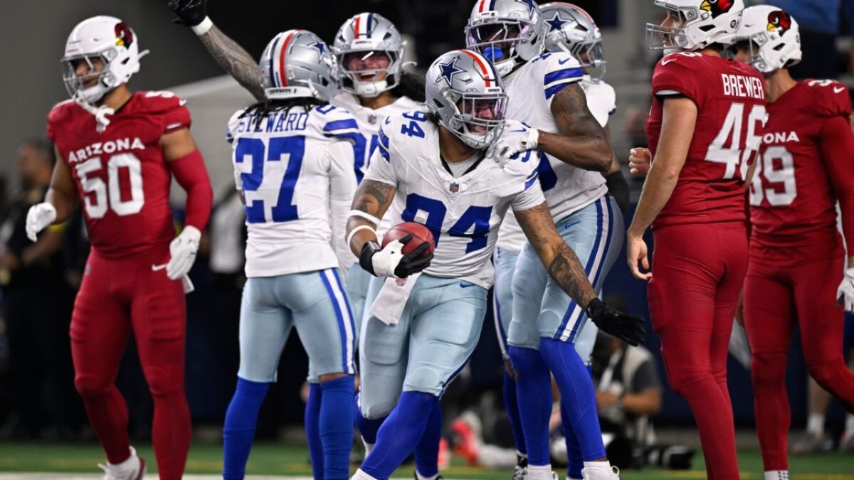 $13 Billion Cowboys Seeking Funds to Help Marshawn Kneeland's Unborn Child Infuriates Fans - "Jerry Could Find The 'Fund' In His Couch Cushions" 1 Marshawn Kneeland after scoring against the Cardinals