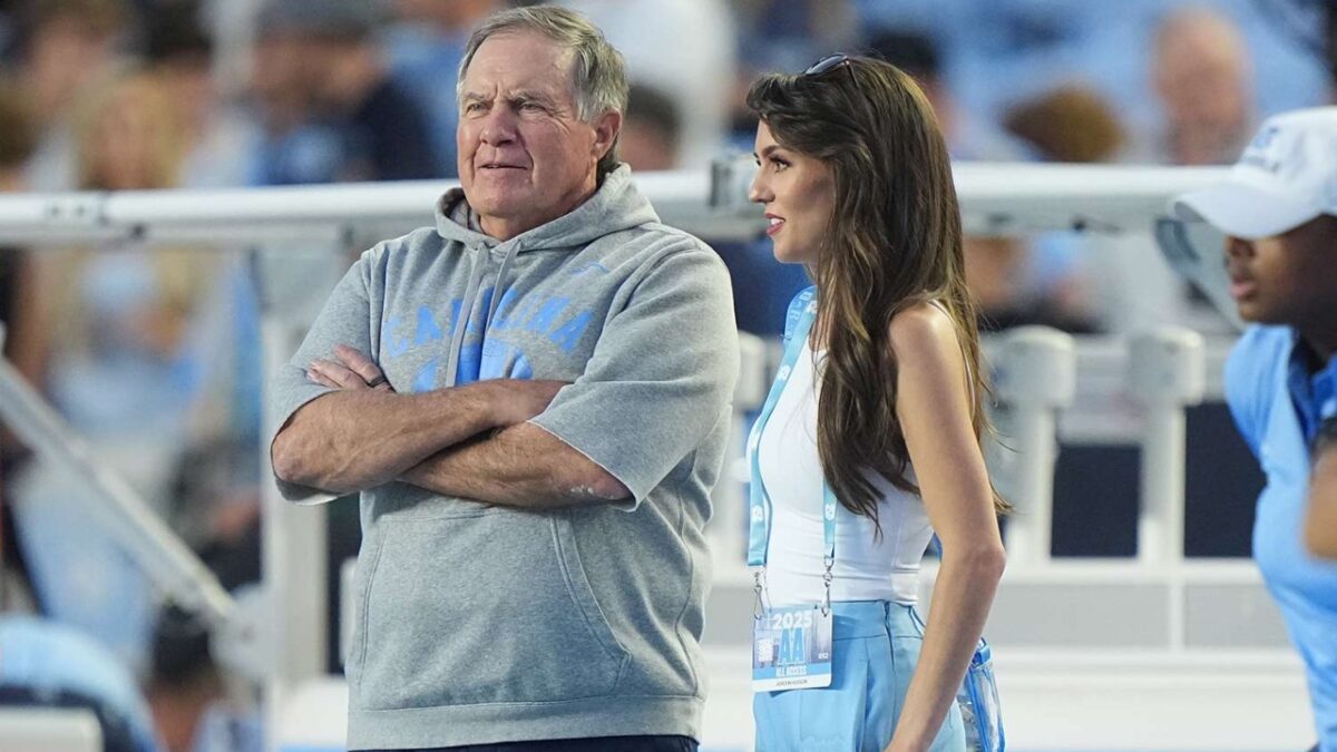 Bill Belichick and girlfriend Jordon Hudson during a UNC game