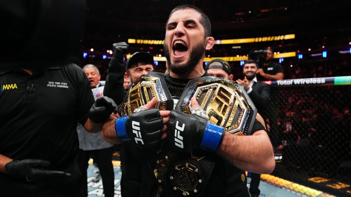 Islam Makhachev with two UFC belts
