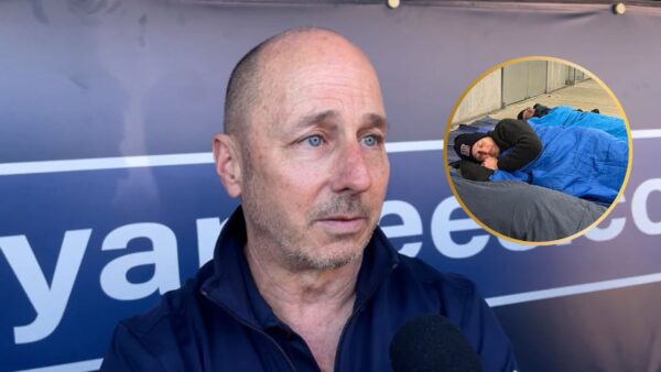 Brian Cashman Mispronouncing “Meme” While Sleeping Outdoors During Charity Event Has Yankees Fans Enraged