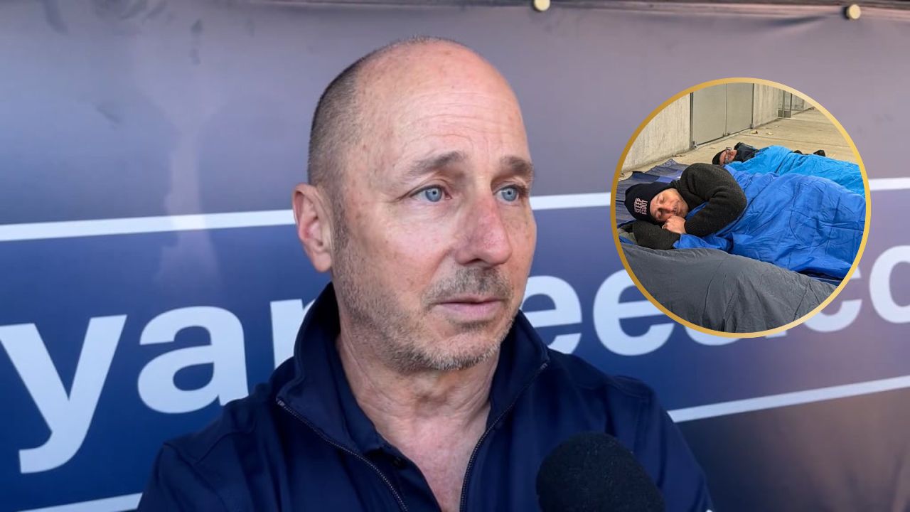 Brian Cashman Mispronouncing “Meme” While Sleeping Outdoors During Charity Event Has Yankees Fans Enraged