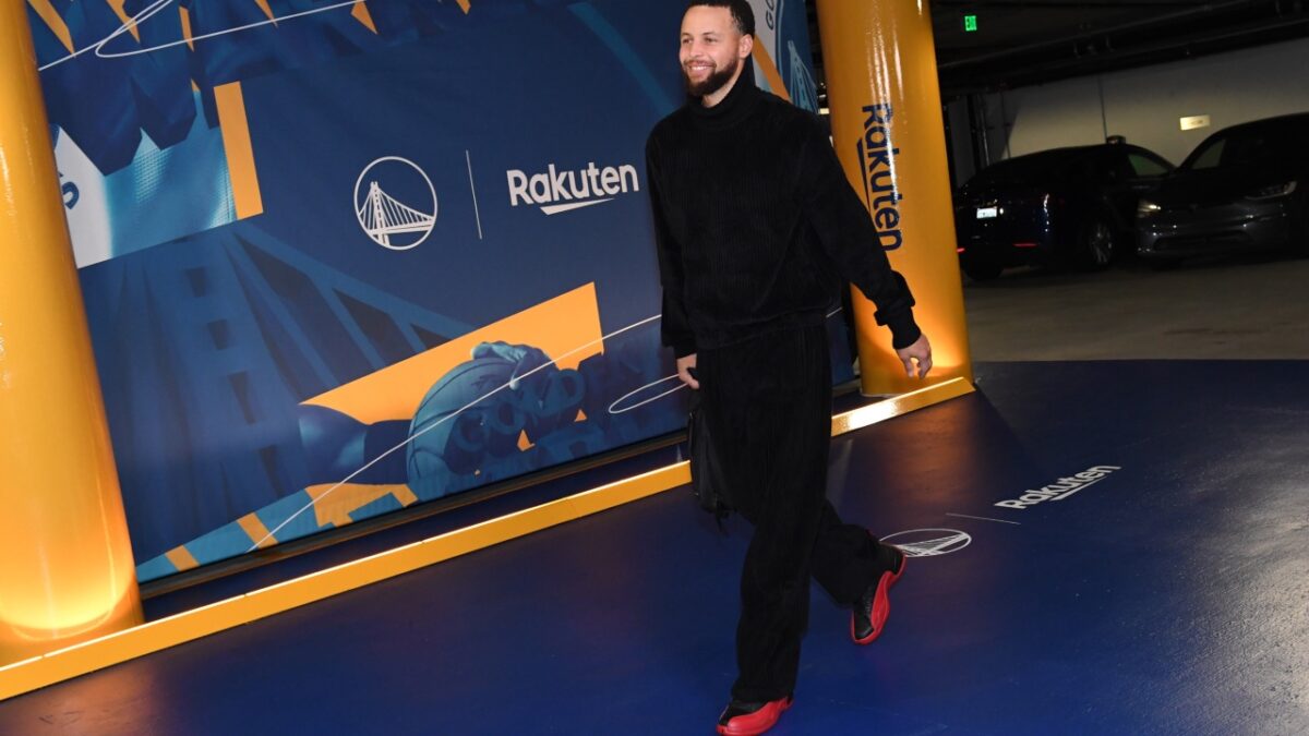 Stephen Curry wearing the Flu Game Air Jordan 12s