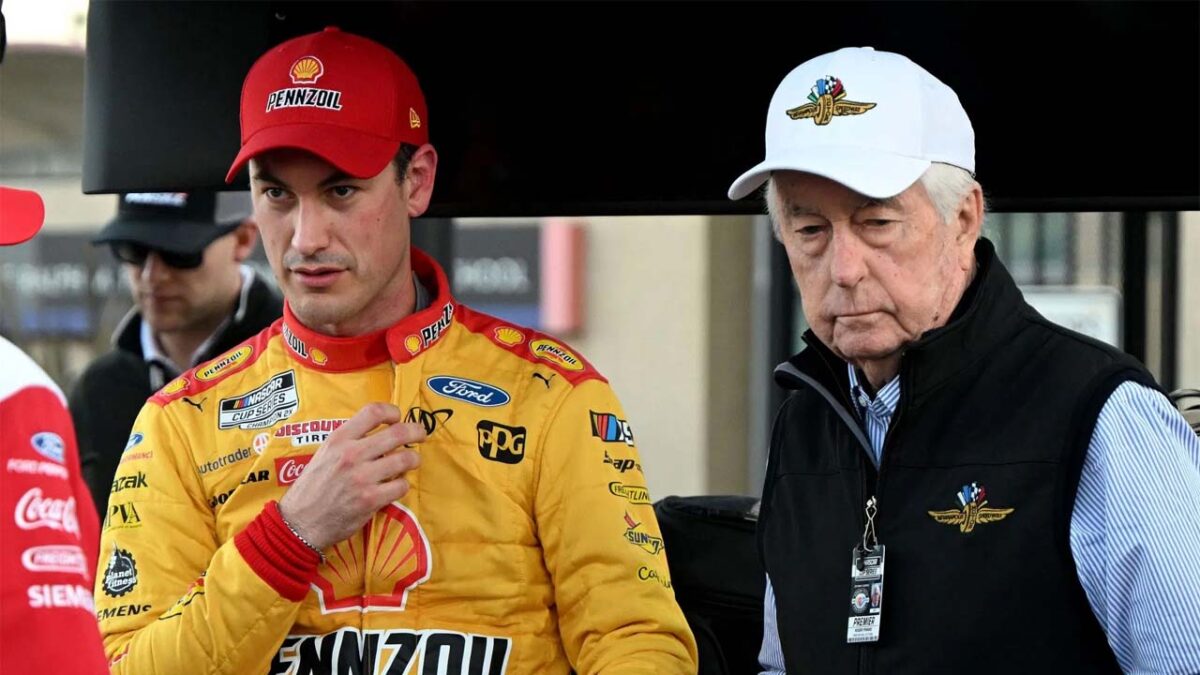 Joey Logano and Roger Penske (via Getty)