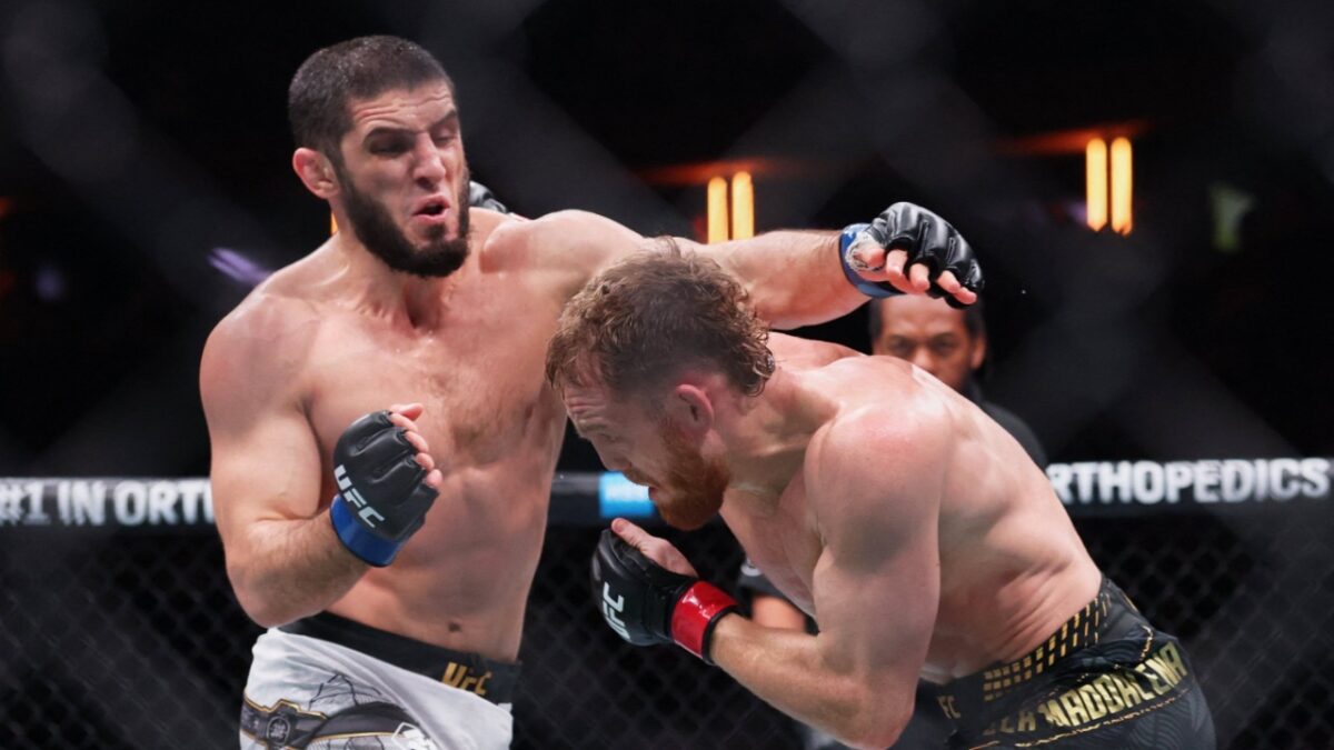 Islam Makhachev striking with Jack Della Maddalena at UFC 322