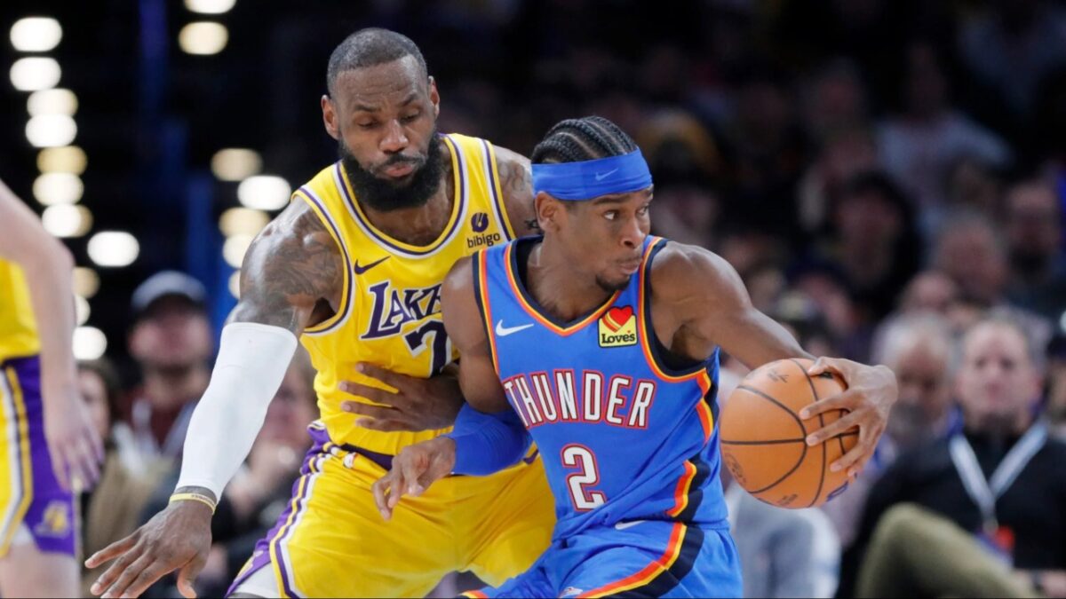 LeBron James defending against Shai Gilgeous-Alexander