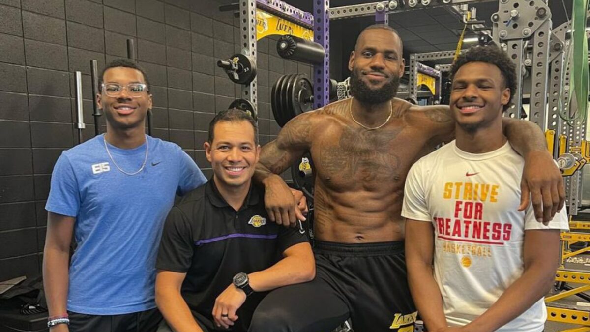 Mike Mancias with LeBron James and his sons