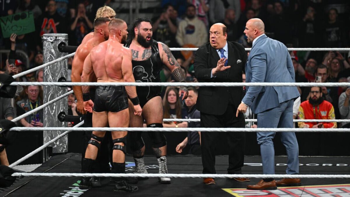 Bron Breakker surrounded by The Vision opposing Adam Pearce on Raw