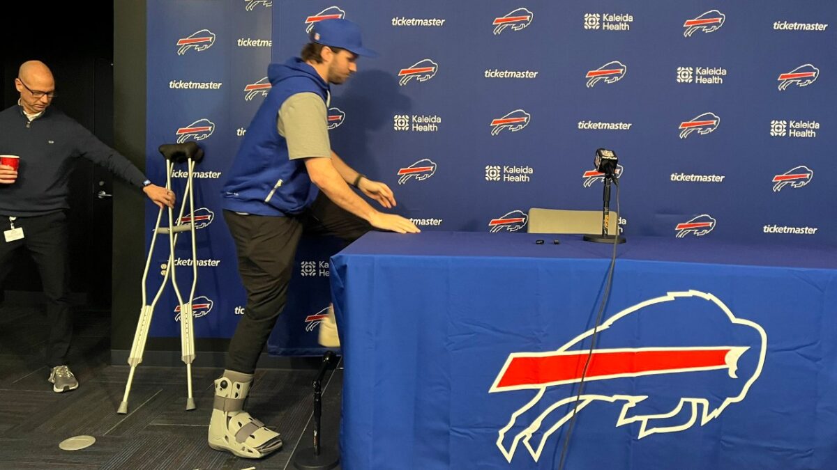 Josh Allen in crutches and a walking boot